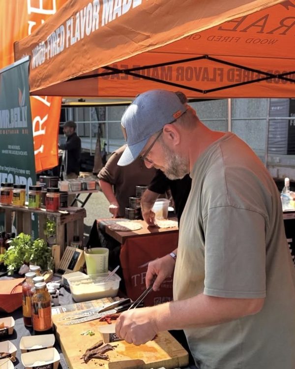 Serving guests at a festival stand